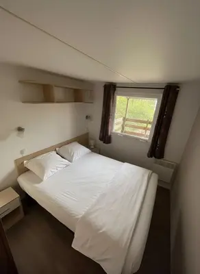 Un ou plusieurs lits dans un hébergement de l'établissement camping du Coucou