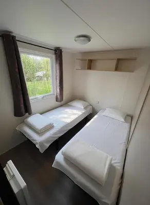 Un ou plusieurs lits dans un hébergement de l'établissement camping du Coucou
