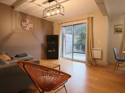 Coin salon dans l'établissement Confort 4* avec Parking et Terrasse au Mont-Dore - FR-1-858-39