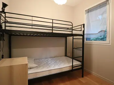 Un ou plusieurs lits dans un hébergement de l'établissement Confort 4* avec Parking et Terrasse au Mont-Dore - FR-1-858-39