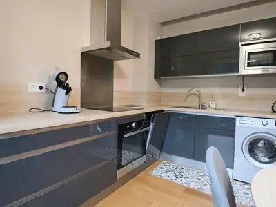 Cuisine ou kitchenette dans l'établissement Confort 4* avec Parking et Terrasse au Mont-Dore - FR-1-858-39