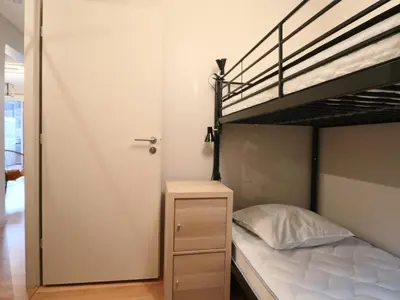Un ou plusieurs lits dans un hébergement de l'établissement Confort 4* avec Parking et Terrasse au Mont-Dore - FR-1-858-39