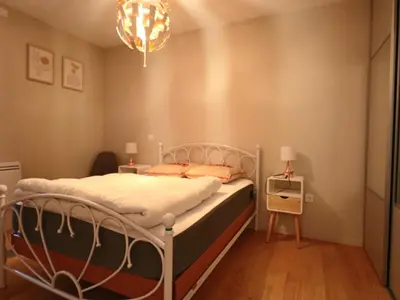 Un ou plusieurs lits dans un hébergement de l'établissement Confort 4* avec Parking et Terrasse au Mont-Dore - FR-1-858-39