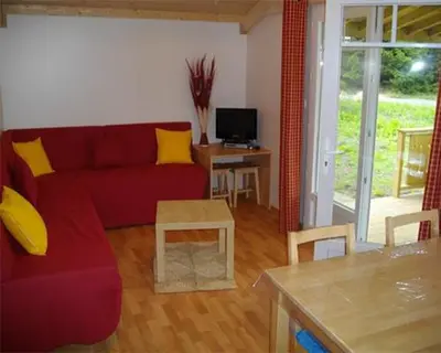 Télévision ou salle de divertissement dans l'établissement Village Equi-Nature