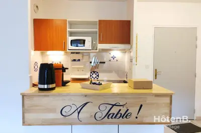 Cuisine ou kitchenette dans l'établissement Balcons de Renoir Parking & piscine - Limoges