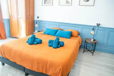 Un ou plusieurs lits dans un hébergement de l'établissement Le Bleu Royal - quiet and comfort - city center