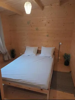 Un ou plusieurs lits dans un hébergement de l'établissement Chalet des étangs