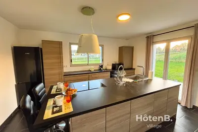 Cuisine ou kitchenette dans l'établissement La Maison du Pinier - Nature