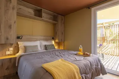 Un ou plusieurs lits dans un hébergement de l'établissement Cottage Milandes