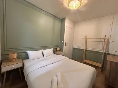 Un ou plusieurs lits dans un hébergement de l'établissement L'Olivier, central et cozy