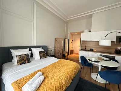 Un ou plusieurs lits dans un hébergement de l'établissement Le Chic, central et cozy