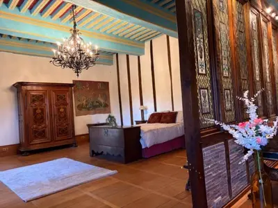 Un ou plusieurs lits dans un hébergement de l'établissement Chateau Eyparsac
