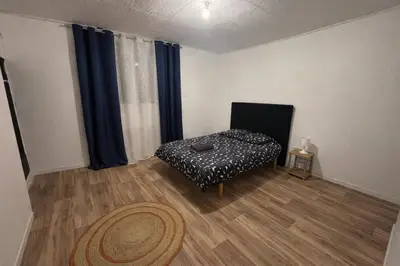 Un ou plusieurs lits dans un hébergement de l'établissement Appartement log 2