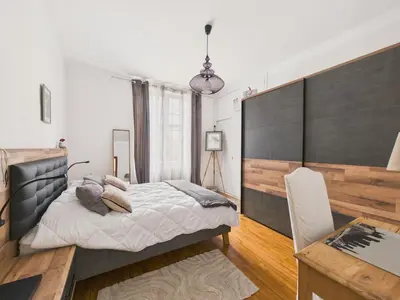 Un ou plusieurs lits dans un hébergement de l'établissement Maison pour 4 avec terrasse - centre Montignac
