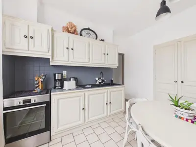 Cuisine ou kitchenette dans l'établissement Maison pour 4 avec terrasse - centre Montignac