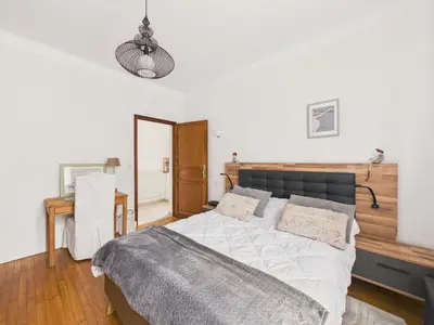Un ou plusieurs lits dans un hébergement de l'établissement Maison pour 4 avec terrasse - centre Montignac