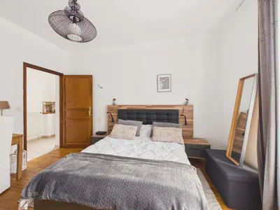 Un ou plusieurs lits dans un hébergement de l'établissement Maison pour 4 avec terrasse - centre Montignac
