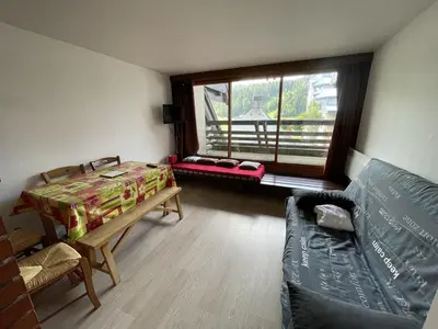 Coin salon dans l'établissement Studio Cosy avec Balcon au 2e Étage, Le Lioran - FR-1-787-147