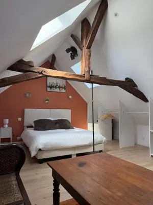 Un ou plusieurs lits dans un hébergement de l'établissement Logement 3 chambres Montignac