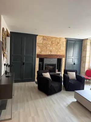 Coin salon dans l'établissement Logement 3 chambres Montignac