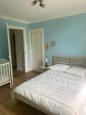 Un ou plusieurs lits dans un hébergement de l'établissement Villa Titaie Maison au calme à 300m du centre