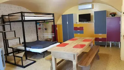 Un ou plusieurs lits dans un hébergement de l'établissement Studio cozy à Aydat avec air conditionné, 26 m²