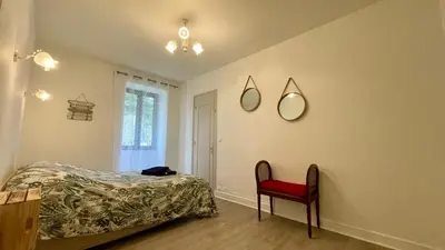 Un ou plusieurs lits dans un hébergement de l'établissement Maison périgourdine avec jardin à 10 min de Sarlat