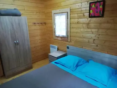 Un ou plusieurs lits dans un hébergement de l'établissement Camping 3 étoiles - Piscine - ccbfeb0