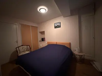 Un ou plusieurs lits dans un hébergement de l'établissement La petite maison de la place