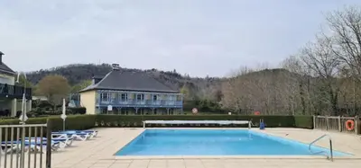 Piscine de l'établissement Appartement AVEC WIFI CHEZ FLO T2 Résidence BELLES RIVES Argentat ou située à proximité