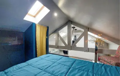 Un ou plusieurs lits dans un hébergement de l'établissement Charmante Maison Avec Piscine