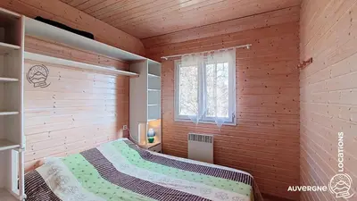 Un ou plusieurs lits dans un hébergement de l'établissement Chalet de la Gougère 2