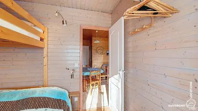 Un ou plusieurs lits dans un hébergement de l'établissement Chalet de la Gougère 2