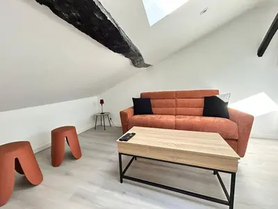 Coin salon dans l'établissement Le Saint-Martial, cosy et intime
