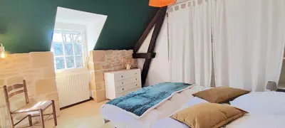 Un ou plusieurs lits dans un hébergement de l'établissement La SALA Bonnac