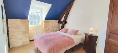 Un ou plusieurs lits dans un hébergement de l'établissement La SALA Bonnac