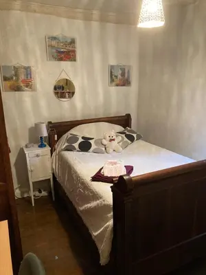 Un ou plusieurs lits dans un hébergement de l'établissement Maison de campagne Chez Tata Yoyo