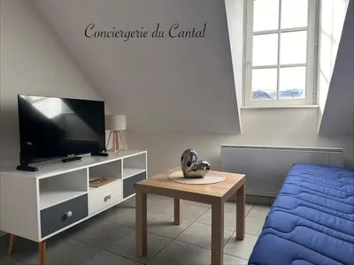 Télévision ou salle de divertissement dans l'établissement La petite maison Murataise