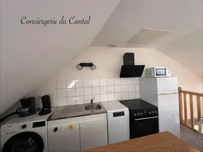 Cuisine ou kitchenette dans l'établissement La petite maison Murataise