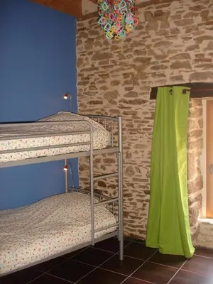 Un ou plusieurs lits dans un hébergement de l'établissement Gîte Gaston, Beynat, Corrèze