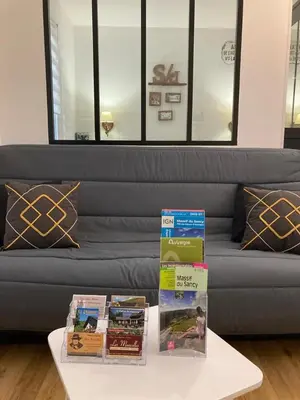 Coin salon dans l'établissement Appartement Les Amethystes 1