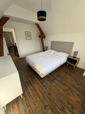 Un ou plusieurs lits dans un hébergement de l'établissement La Maison des Voyageurs - 3 Chambres