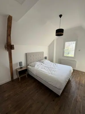 Un ou plusieurs lits dans un hébergement de l'établissement La Maison des Voyageurs - 3 Chambres
