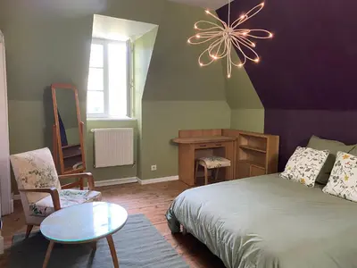 Un ou plusieurs lits dans un hébergement de l'établissement Domaine de la Jordanne - B&B