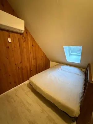 Un ou plusieurs lits dans un hébergement de l'établissement LK gîte la forêt