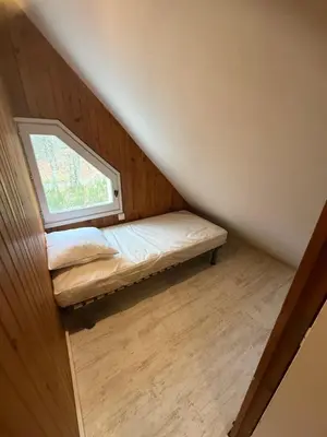Un ou plusieurs lits dans un hébergement de l'établissement LK gîte la forêt