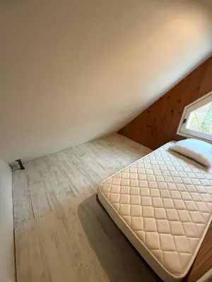 Un ou plusieurs lits dans un hébergement de l'établissement LK gîte la forêt
