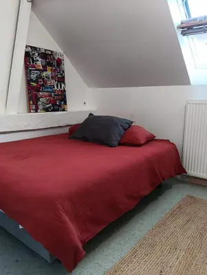 Un ou plusieurs lits dans un hébergement de l'établissement Maison en pierre au pays d'Uzerche