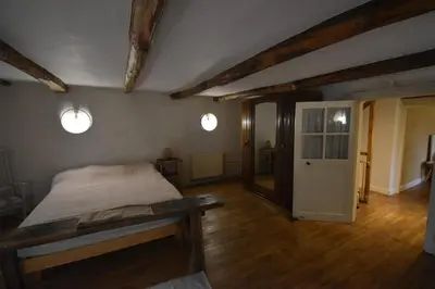 Un ou plusieurs lits dans un hébergement de l'établissement Gîte Léon, Beynat, Corrèze