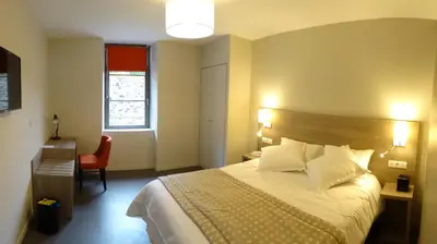Un ou plusieurs lits dans un hébergement de l'établissement Parc Hôtel Pompadour